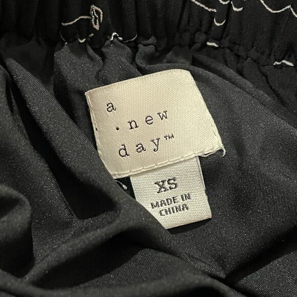 a new day X Vital Voices Face Print Pleated Skirt - Black - XS - Picture 8 of 9